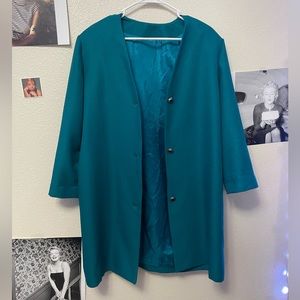 Teal blazer.